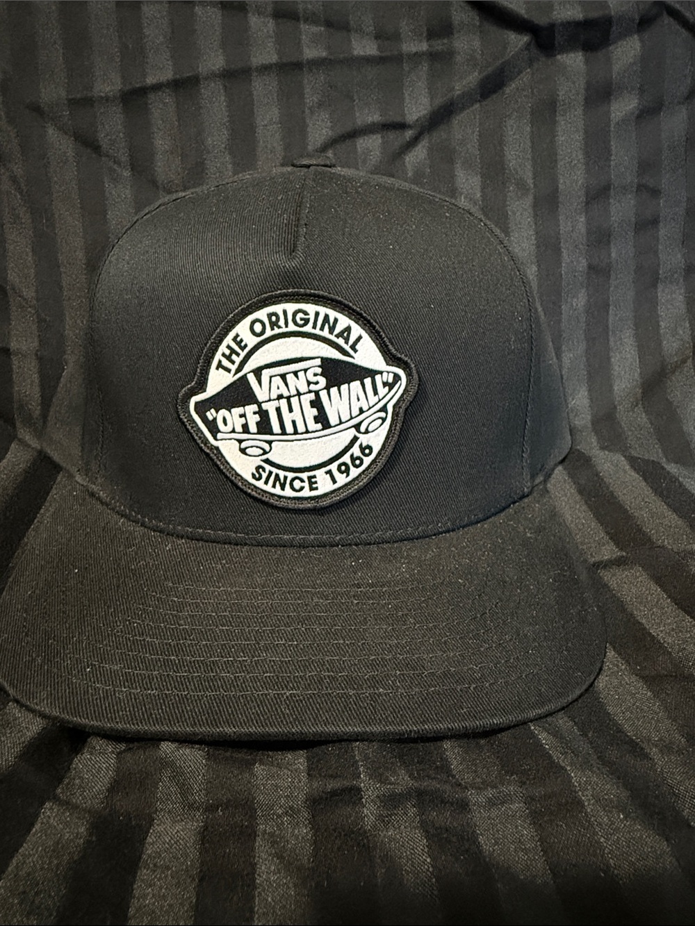 Vans Black Snapback Hat with White 'Off The Wall' Round Patch